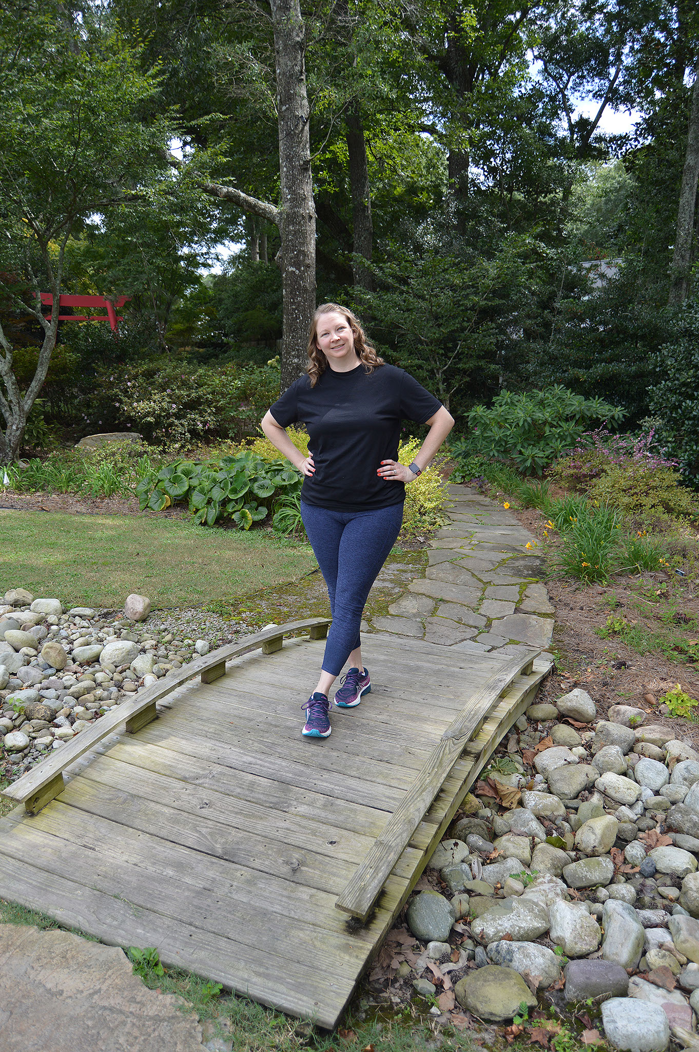 Ashlea standing on bridge.